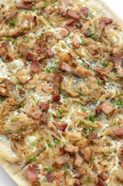 Flammkuchen tarte flambee rectangular pizza with bacon and chicken on white background