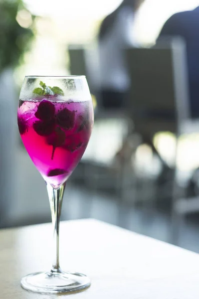 raspberry and red dragon fruit prosecco wine spritzer cocktail