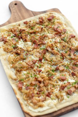 Flammkuchen tarte flambee rectangular pizza with bacon and chicken on white background