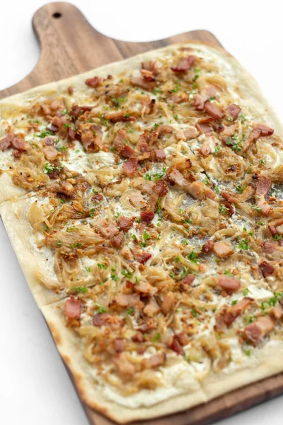 Flammkuchen tarte flambee rectangular pizza with bacon and chicken on white background