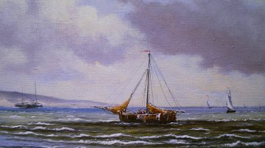 Denizde yelkenli teknesi