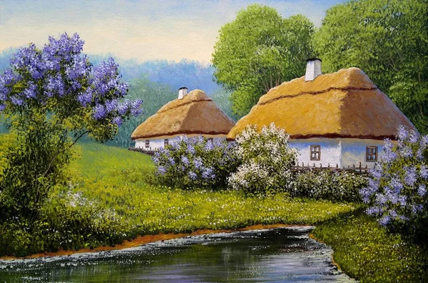 Pastoral tarlaları ve kulübeleri olan eski Ukrayna köyünün güzel manzarası. 