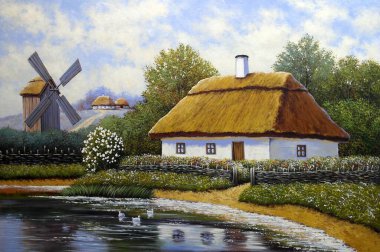 beautiful landscape of old Ukrainian village with pastoral fields and huts 