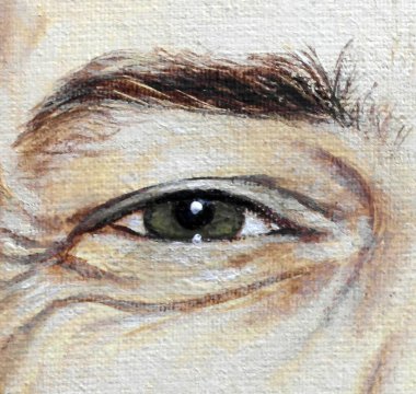 Tüylü bir kadın gözünün yakın çekimi.