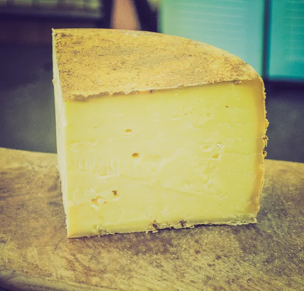 Vintage olhando queijo Cheddar — Fotografia de Stock