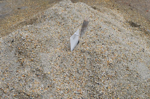 Trowel in sand — Stock Photo, Image