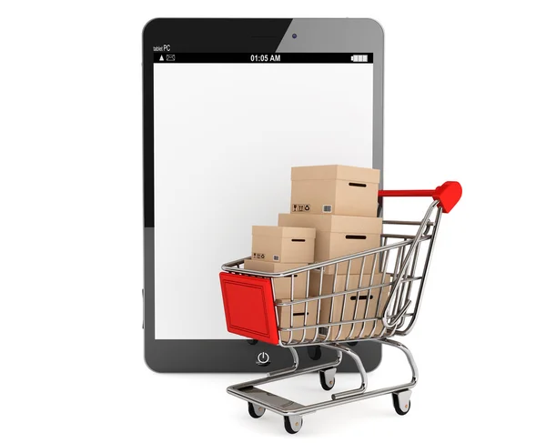 Carro de la compra con cajas cerca de Tablet PC — Foto de Stock