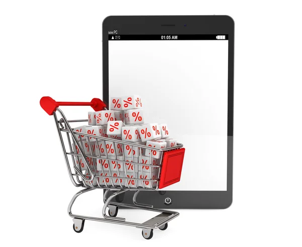 Shopping cart with discount cubes near Tablet PC — Stock Photo, Image