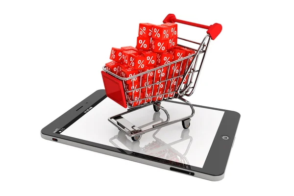 Shopping cart with discount cubes over Tablet PC — Stock Photo, Image