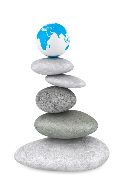 Stone pile in a Zen Garden with a Earth globe — Stock Photo, Image