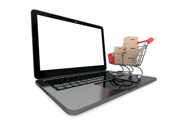 Concetto di shopping online. Carrello con Scatole sul Laptop — Foto Stock