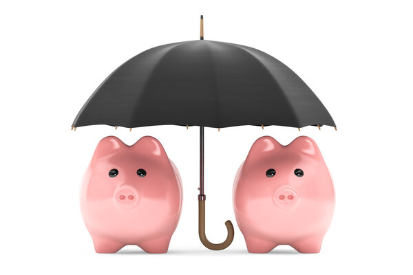 Wealth protection concept. Piggy Banks under umbrella