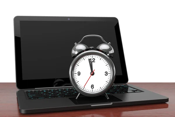 Modern Laptop with Alarm Clock — Stock Photo, Image