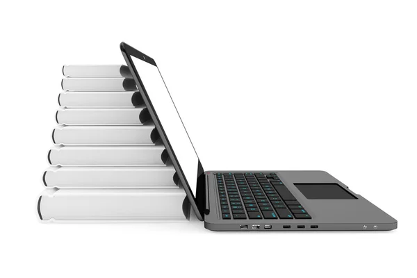 Laptop computer with stack of books — Stock Photo, Image