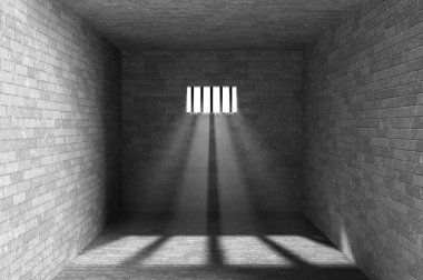 Çubuklu pencereden parlayan ışık ile cezaevi iç