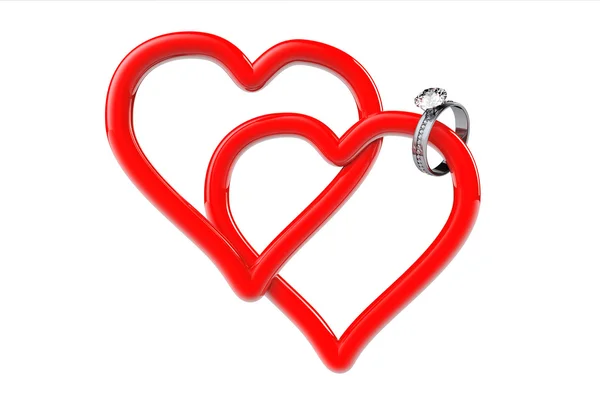 Two red hearts with diamond wedding ring — Stock Photo, Image