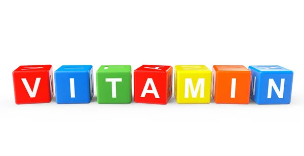 Speelgoed kubussen als vitamine teken — Stockfoto