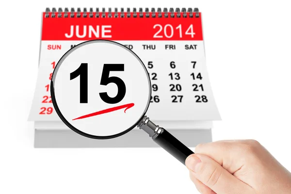 Father's Day Concept. 15 june 2014 calendar with magnifier — Stock Photo, Image