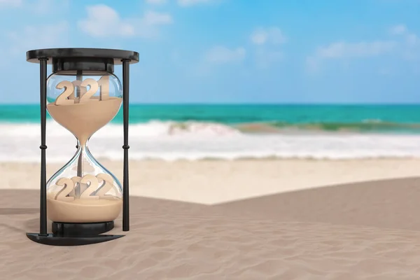 2022年正月休暇の概念 砂時計の中に落ちる砂は 2021年から2022年までの形をとって 海洋砂漠化した海岸の極端な閉鎖にあります 3Dレンダリング — ストック写真
