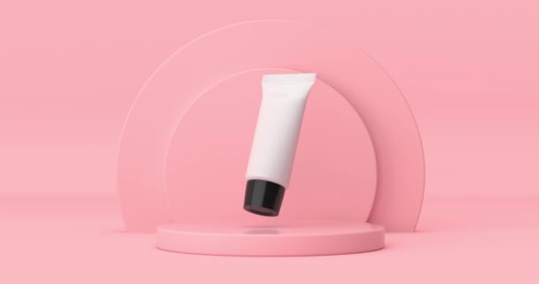 Resolution Video Biała Tuba Kosmetyczna Obracająca Się Różowych Cylindrach Produkty — Wideo stockowe