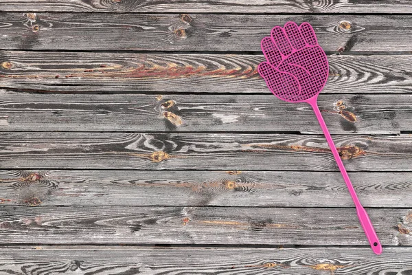 Pink Flyswatter Shape Hand Plank Wooden Table Background Rendering — Stok fotoğraf