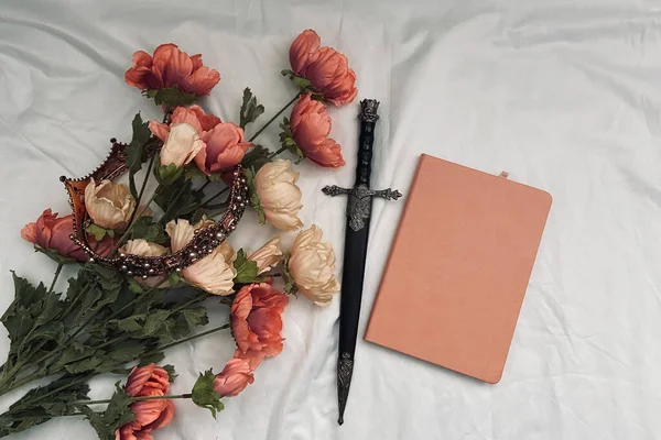 Flat lay mock up for books with flowers and blank book