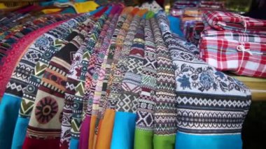 Thai Northern Sarong, Handwoven cotton fabric natural dyeing in vintage tone background. Thai traditional clothing.