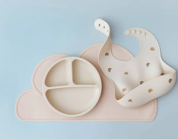 Set Silicone Dishware Baby Accessories Blue Light Background Flat Lay — стоковое фото
