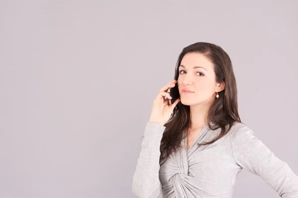 Girl talking to mobile — Stock Photo, Image