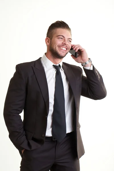 Businessman talking to mobile — Stock Photo, Image