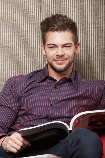 Man on the sofa — Stock Photo, Image