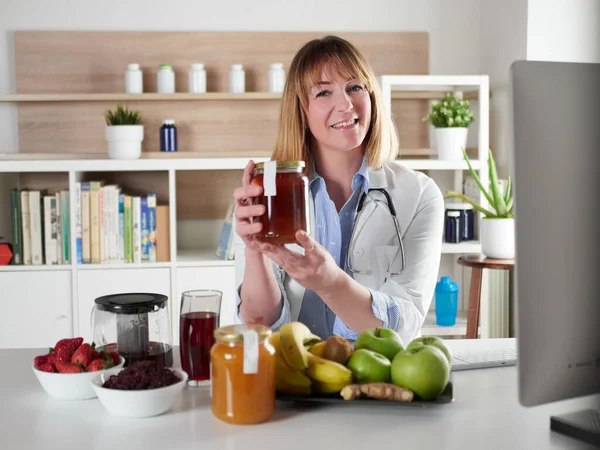 Female Nutritionist Holding Honey Office Studio — Fotografia de Stock