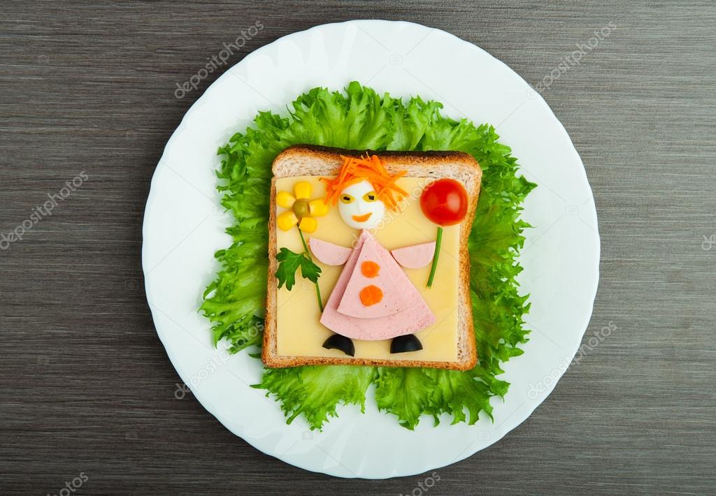 Design food. Creative sandwich for child with picture little ma