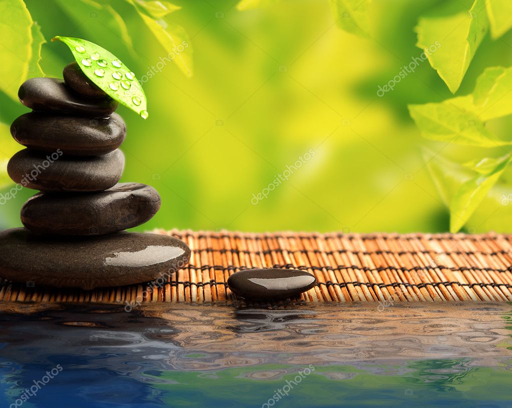 Green eco background with spa stones and leaves with water Stock Photo by ©evgenyataman 14709233