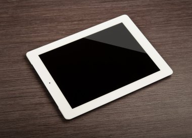 White blank tablet pc on a desk