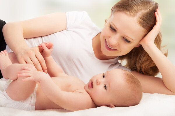 Happy family. young mother and baby rests