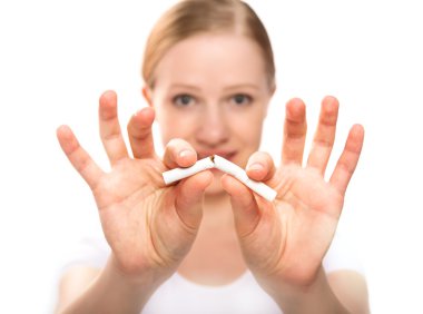 woman breaking cigarette. concept stop smoking clipart