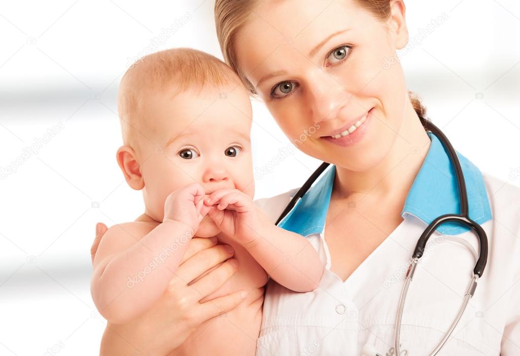 Pediatrician woman doctor holding baby
