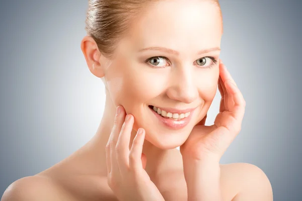 Skin care. face beautiful young healthy woman Royalty Free Stock Photos