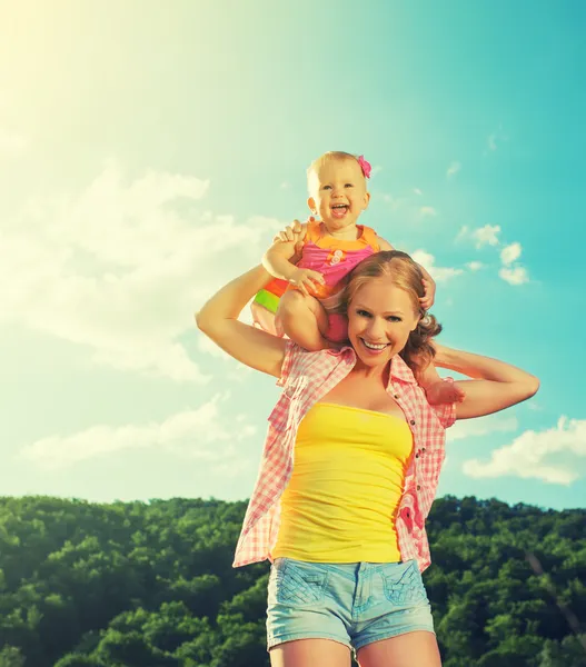 Happy family. mother and daughter baby girl playing on nature — Stock Photo, Image