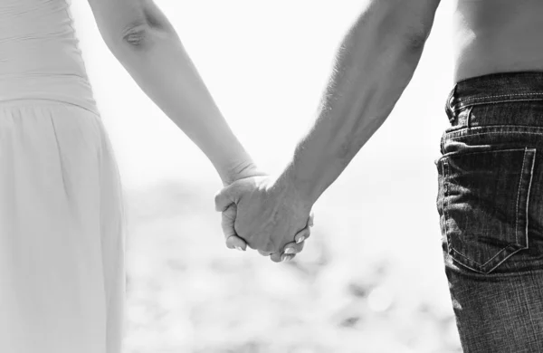 Concept of love and family. the hands of lovers, men and women i — Stock Photo, Image