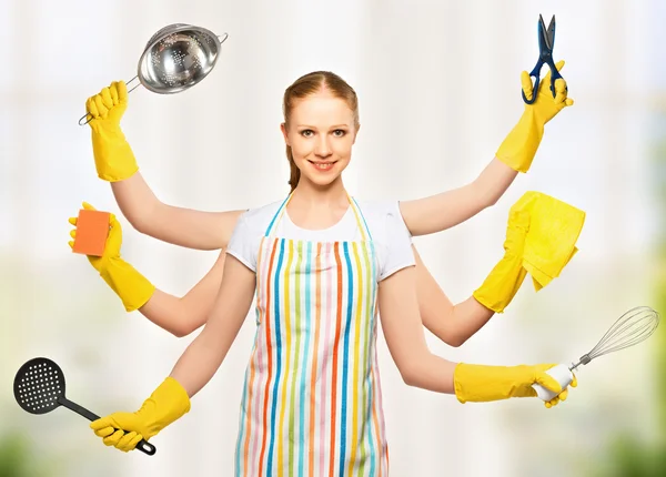 Concept idea. omnipotent universal woman housewife with many han — Stock Photo, Image