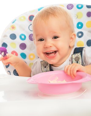 mutlu bebek çocuk kendisi bir kaşık ile eats