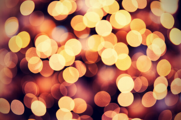 red golden Christmas lights background with bokeh