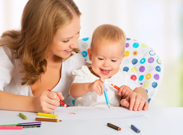 Mother and baby draw color pencil