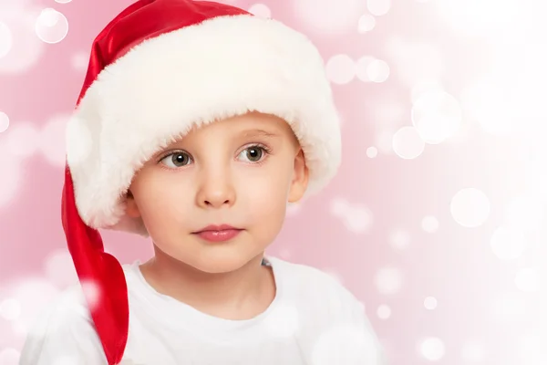 Маленький хлопчик у різдвяній шапці — стокове фото