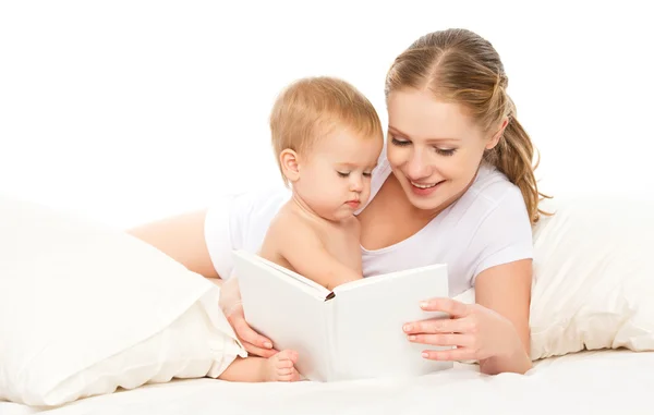 Mother reading book baby in bed before going to sleep — Stock Photo, Image