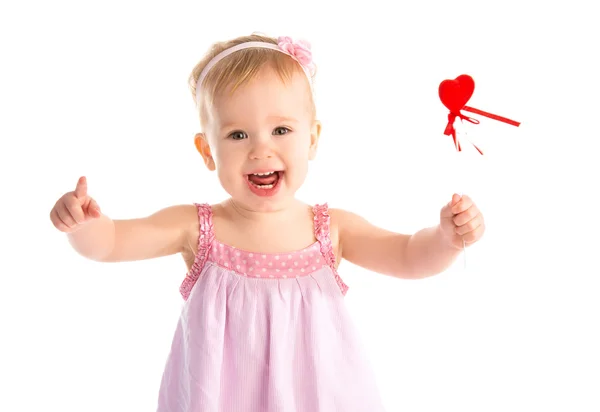Happy baby girl with red heart isolated — Stock Photo, Image