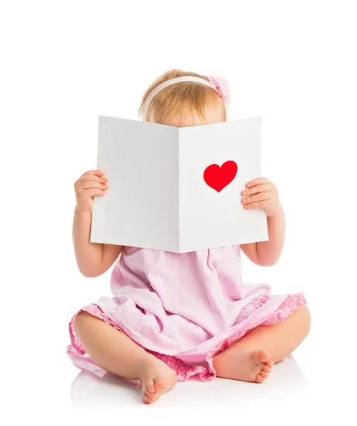 Beautiful baby girl with cute valentine postcard with a red hear — Stock Photo, Image