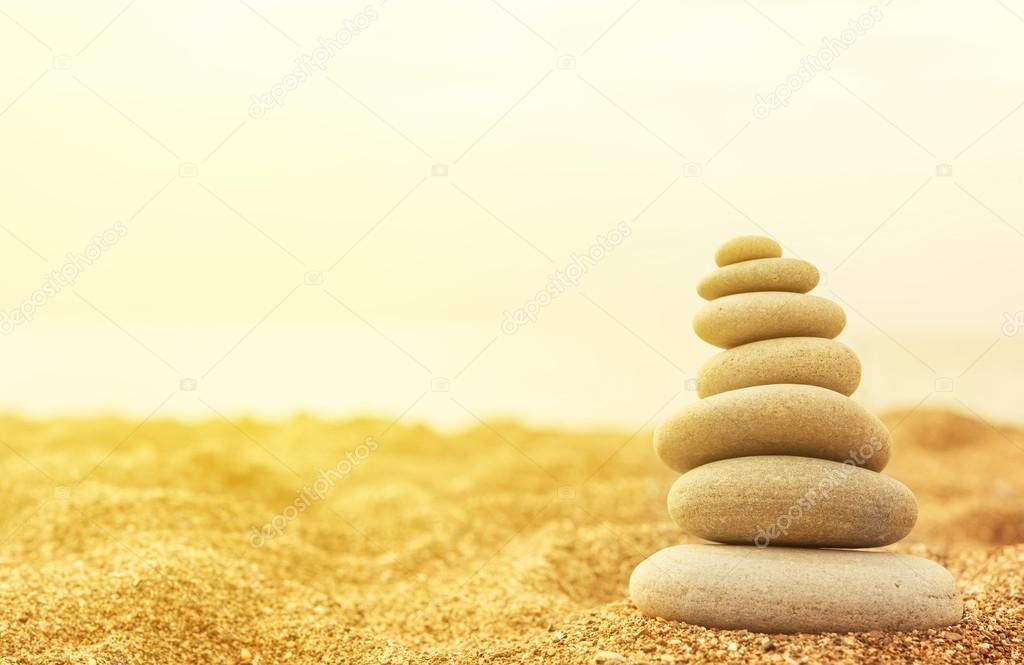 stack of stones in the sand